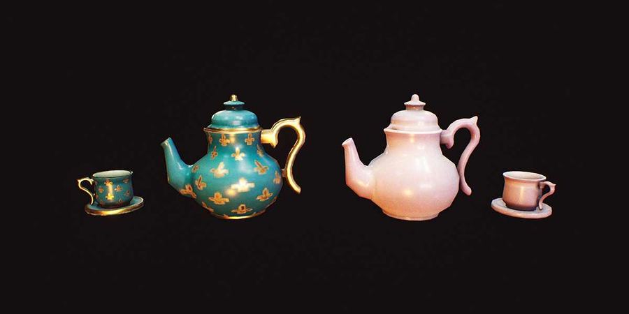 Two painted teapots with matching cups