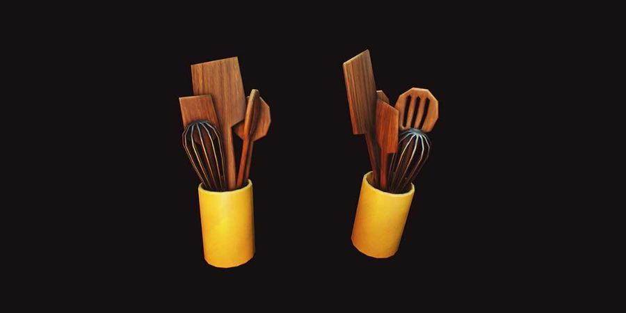 Pot holding whisks and wooden spoons